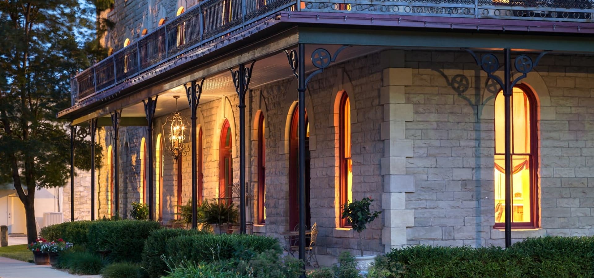 Night photo of historic Elgin Hotel front